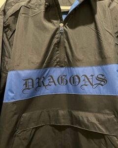 A Sport-Tek Zippered Pocket Anorak